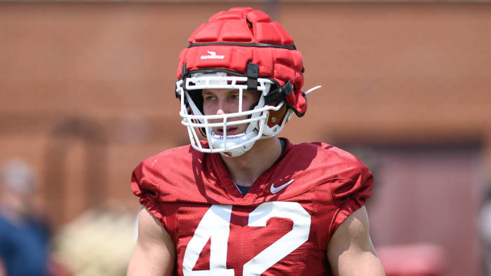 Alabama Crimson Tide transfer Drew Sanders listens to defensive coaches in practice while gearing up for the Razorbacks' season opener against Cincinnati in Fayetteville.